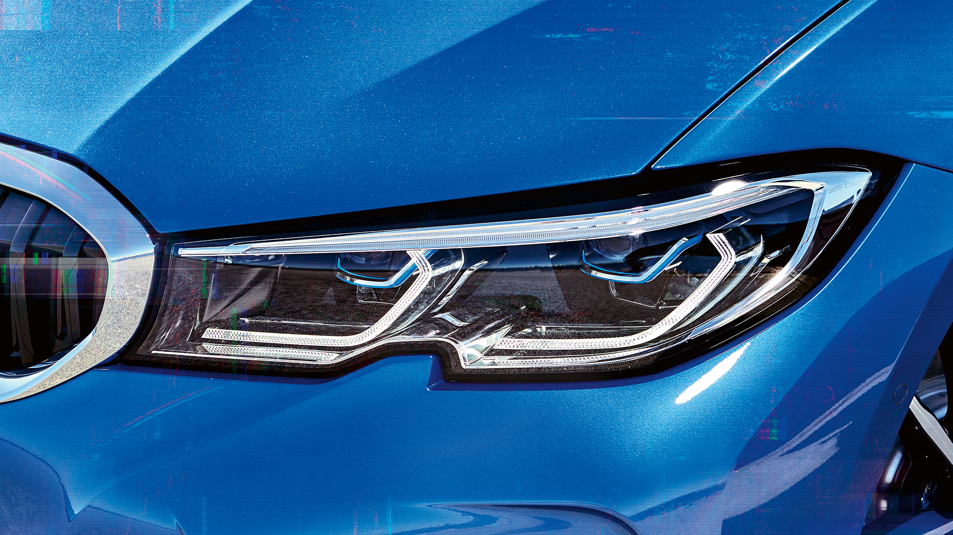 BMW 3 cерии Седан, лазерные фары BMW. Боковой крупный план правых передних лазерных фар BMW.