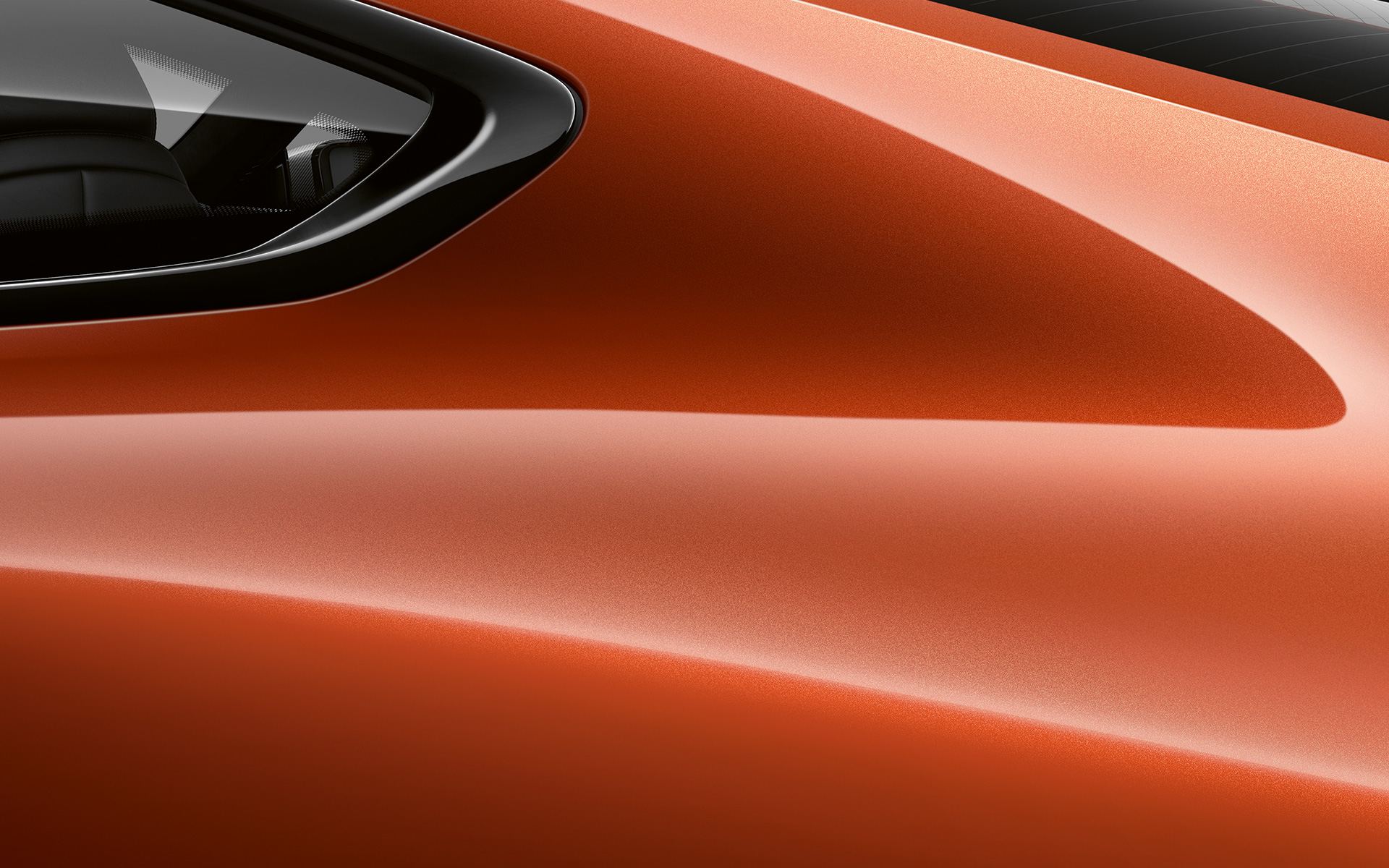 BMW 8 серии Coupe, задняя стойка крупным планом Задняя стойка BMW 8 серии Coupe цвета «Оранжевый Закат металлик».